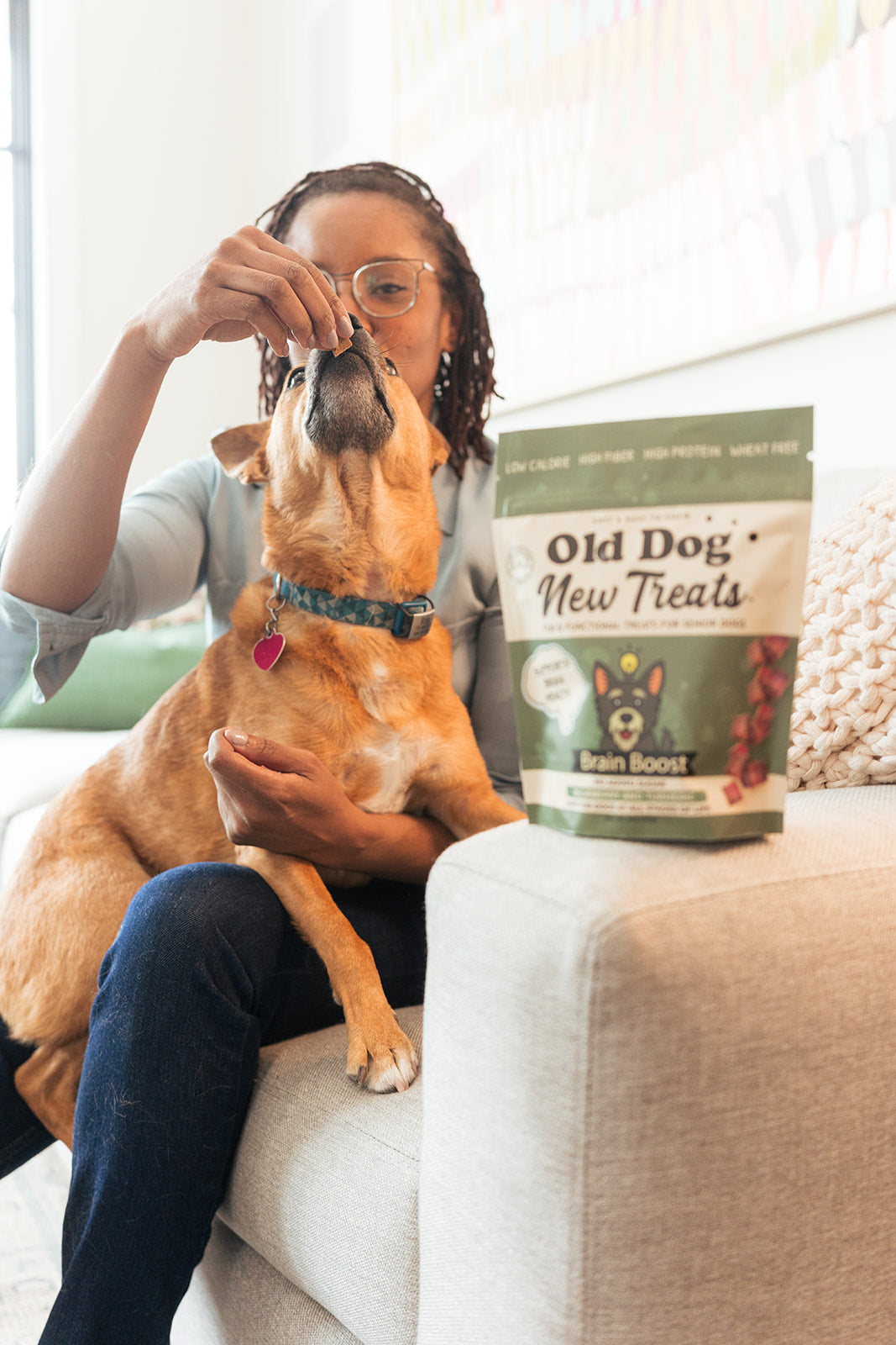Rza enjoying Brain Boost functional senior dog treats by Old Dog New Treats